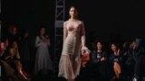 Dinagul Tasova modelling a dress at Astana Fashion Night taken from model's account 