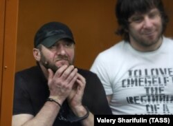 Khamzat Bakhayev (left) next to Temerlan Eskerkhanov in the Moscow District Military Court on their day of sentencing, July 13, 2017.