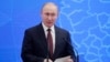 Путин подписал законы о штрафах за "фейковые" новости и неуважение к власти 