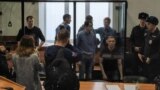 RUSSIA -- Members of alleged terrorist community known as Set (Network), who are accused of plotting to overthrow the government by staging multiple terrorist attacks, attend a court hearing in Penza, February 10, 2020