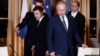 Analysts: At Paris Summit, Putin Holds The Risk Advantage