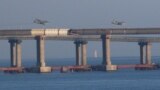 UKRAINE -- Russian jet fighters fly over a bridge connecting the Russian mainland with the Crimean Peninsula after three Ukrainian navy vessels were stopped by Russia from entering the Sea of Azov via the Kerch Strait in the Black Sea, Crimea November 25,