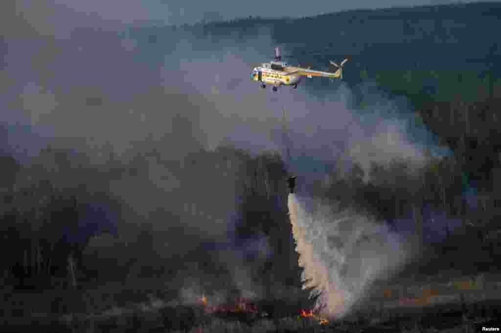 Тушение пожара в Зоне отчуждения вокруг Чернобыльской АЭС при помощи вертолета