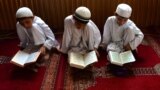 Иллюстрация: афганские дети изучают Коран в Рамадан