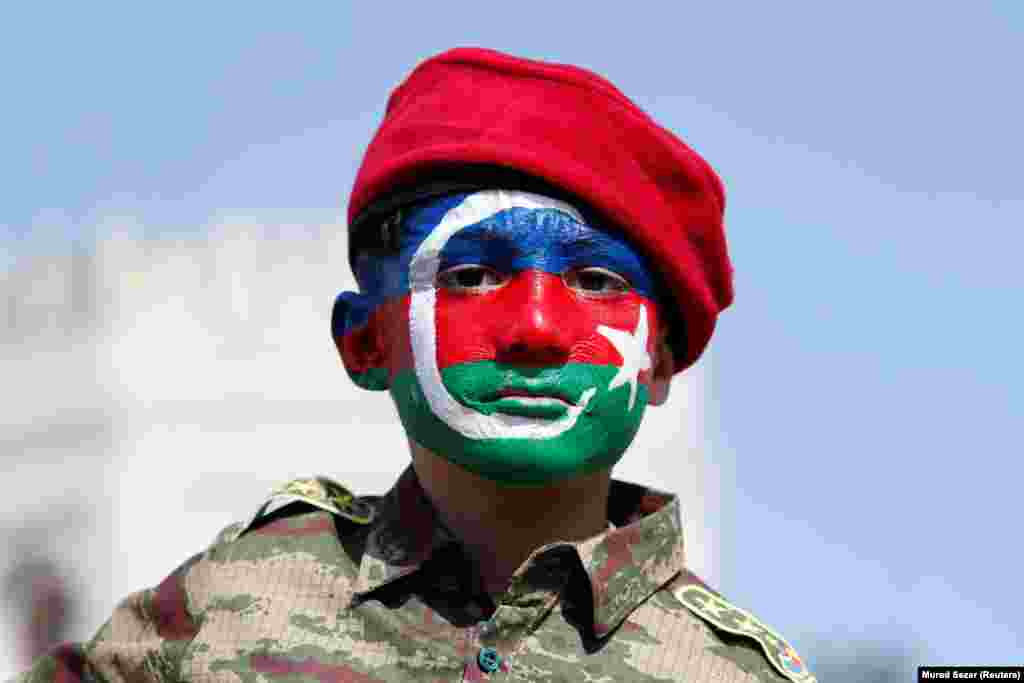 With his face painted in the colors of the Azerbaijani flag, Yusuf, a 6-year-old boy from Azerbaijan, takes part in a protest against Armenia in Istanbul, Turkey on October 4, 2020.&nbsp; Turkey, Azerbaijan&#39;s cultural kin and closest strategic partner, has supported Baku&#39;s calls for the withdrawal of Armenian troops from Nagorno-Karabakh and seven surrounding Azerbaijani regions.&nbsp;
