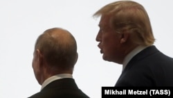 Трамп и Путин на саммите G20 в Осаке, 28 июня 2019 года