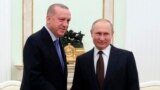 RUSSIA -- Russian President Vladimir Putin, right, and Turkish President Recep Tayyip Erdogan pose during their meeting at the Kremlin in Moscow, March 5, 2020