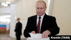 Путин голосует на выборах в Мосгордуму, 2019 год. Фото: ТАСС