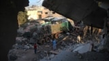 Остатки груза гуманитарного конвоя, попавшего под авиаудар в районе сирийского города Урум аль-Кубра