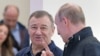 CRIMEA -- Russian President Vladimir Putin (R) speaks with Arkady Rotenberg as they attend the opening ceremony for a bridge linking the annexed Crimean Peninsula to Russia, in Kerch, May 15, 2018