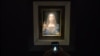 U.S. -- visitor takes a photo of the painting 'Salvator Mundi' by Leonardo da Vinci at Christie's New York Auction House, in New York, November 15, 2017