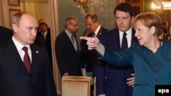 Италия - Ангела Меркель, Владимир Путин и итальянский премьер Маттео Рензи