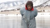 The Ice-Skating Babushka Of Baikal