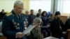 Russia -- former Soviet officer Nikolai Ryabchevsky reads his notes during a court hearing in Yekaterinburg on April 2, 2017