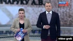 Ahead Of Ukraine Talks, Russian TV Promotes Fake Report About 'Donbas Deportation'