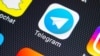 Sankt-Petersburg, Russia, February 9, 2018: Telegram application icon on Apple iPhone X screen close-up. Telegram app icon. Telegram is an online social media network. Social media app