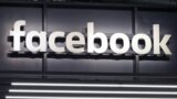 GERMANY -- The signage of Facebook illuminated at company stand during the 2nd press preview day of the International Motor Show IAA in Frankfurt Main, Germany, 12 September 2017 (reissued 26 July 2018)