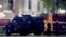 City of Orange police officers stand in front of a building after a shooting in Orange, California, U.S. March 31, 2021