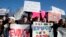 U.S. -- Young people participate in the national school walkout over gun violence at a rally on Pennsylvania Avenue outside the White House in Washington, DC, USA, 14 March 2018