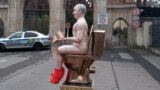 Prague. The activists installed a toilet and put Putin on it. Photo by Kaputin.Democrats.Stop.Putin