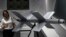 RUSSIA -- A visitor examines the new product Concern 'Kalashnikov' the shock drones kamikaze UAV 'ZALA Lancet'. prior the International Military Technical Forum 'Army 2019' in Patriot Park in Alabino, Moscow region, June 24, 2019