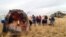 KAZAKHSTAN -- Members of a search and rescue team work on the site of landing of the Soyuz MS-16 space capsule in a remote area outside Zhezkazgan, October 22, 2020