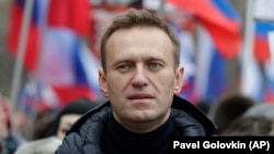 Алексей Навальный на марше памяти убитого оппозиционера Бориса Немцова 24 февраля 2019 года