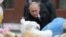 RUSSIA -- Russian President Vladimir Putin visits the site of fire, that killed at least 64 people at a busy shopping mall, in Kemerovo, March 27, 2018