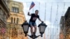 RUSSIA -- A Russia's fan celebrates after Russia won the Russia 2018 World Cup round of 16 football match against Spain, in central Moscow, July 1, 2018