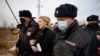 RUSSIA -- Russian police officers detain Anastasiya Vasilyeva, a doctor and ally of Kremlin critic Aleksei Navalny, near the IK-2 corrective penal colony, where Navalny serves his jail term, in the town of Pokrov, April 6, 2021