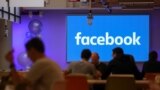 UK - Employees have lunch at the canteen at Facebook's new headquarters, designed by Canadian-born American architect Frank Gehry, at Rathbone Place in central London on December 4, 2017.