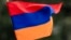 TOPSHOT - A child waves an Armenian flag as Armenians protest against Azerbaijan's offensive in Nagorno-Karabakh, at Place du Canada in Montreal, Quebec, Canada, on October 1, 2023.