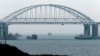 UKRAINE -- A general view shows a road-and-rail bridge, which is constructed to connect the Russian mainland with the Crimean peninsula, at sunrise in the Kerch Strait, Crimea, November 26, 2018