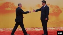 His new best friend. Vladimir Putin and Xi Jinping.