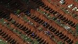 Gravediggers open new graves as the number of dead rose after the coronavirus disease (COVID-19) outbreak, at Vila Formosa cemetery, Brazil's biggest cemetery, in Sao Paulo,