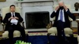 USA-UKRAINE -- U.S. President Joe Biden puts a face mask on during a meeting with Ukraine's President Volodymyr Zelenskiy