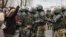 Belarus - Belarusian law enforcement officers block opposition supporters during their rally to reject the presidential election results in Minsk, 1nov2020