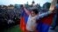 ARMENIA -- A boy holds an Armenian flag during a rally held by supporters of opposition leader Nikol Pashinyan, in the country's second largest city of Gyumri, Armenia April 27, 2018