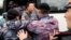 KAZAKHSTAN -- Police detain opposition supporters during a protest calling for free and fair elections during the presidential elections in Nur-Sultan, June 9, 2019