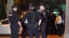 RUSSIA -- Police officers are seen outside an apartment block where a man has taken three hostages after a domestic conflic, in Moscow, May 24, 2018