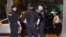 RUSSIA -- Police officers are seen outside an apartment block where a man has taken three hostages after a domestic conflic, in Moscow, May 24, 2018