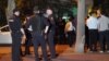 RUSSIA -- Police officers are seen outside an apartment block where a man has taken three hostages after a domestic conflic, in Moscow, May 24, 2018