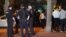 RUSSIA -- Police officers are seen outside an apartment block where a man has taken three hostages after a domestic conflic, in Moscow, May 24, 2018