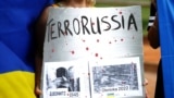 CROATIA – A poster on the protest action against the killing of Ukrainian prisoners of war in a colony in Olenivka in the occupied part of the Donetsk region. Zagreb, Croatia, July 31, 2022