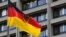 Germany -- A German flag flies in front of the headquarters of the German central bank (Bundesbank) in Frankfurt, 02May2011