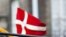 Denmark -- European and a Danish flags fly on a bus in Copenhagen, 02Jan2011
