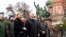 RUSSIA -- Russian President Vladimir Putin and Minister of Culture Olga Lyubimova attend a ceremony at the monument of Kuzma Minin and Dmitry Pozharsky on the Red Square near the Kremlin, marking the National Unity Day, in Moscow, November 4, 2020 
