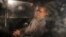 RUSSIA -- Russian former Economy Minister Aleksei Ulyukayev, who was charged with accepting a bribe, sits in a car after a court hearing in Moscow, December 4, 2017