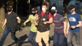 Belarus -- detention of RFE/RL journalist Andrej Rabchyk at a picket in Minsk on June 19