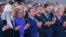 Бурные продолжительные аплодисменты: с какими лицами слушали Путина